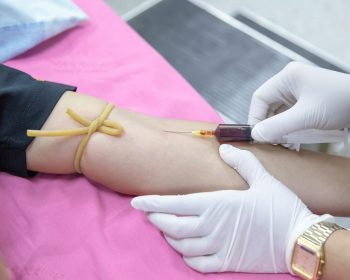 Injecting of Syringe on Person's Arm